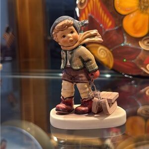 Hummel Boy with Sled Figurine in Red and Brown